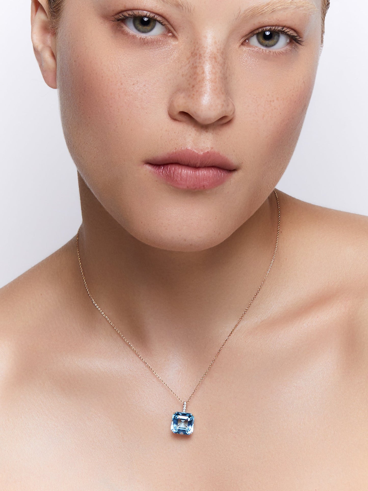 Swiss Blue Topaz Necklace with 14kt Asscher Cut Design