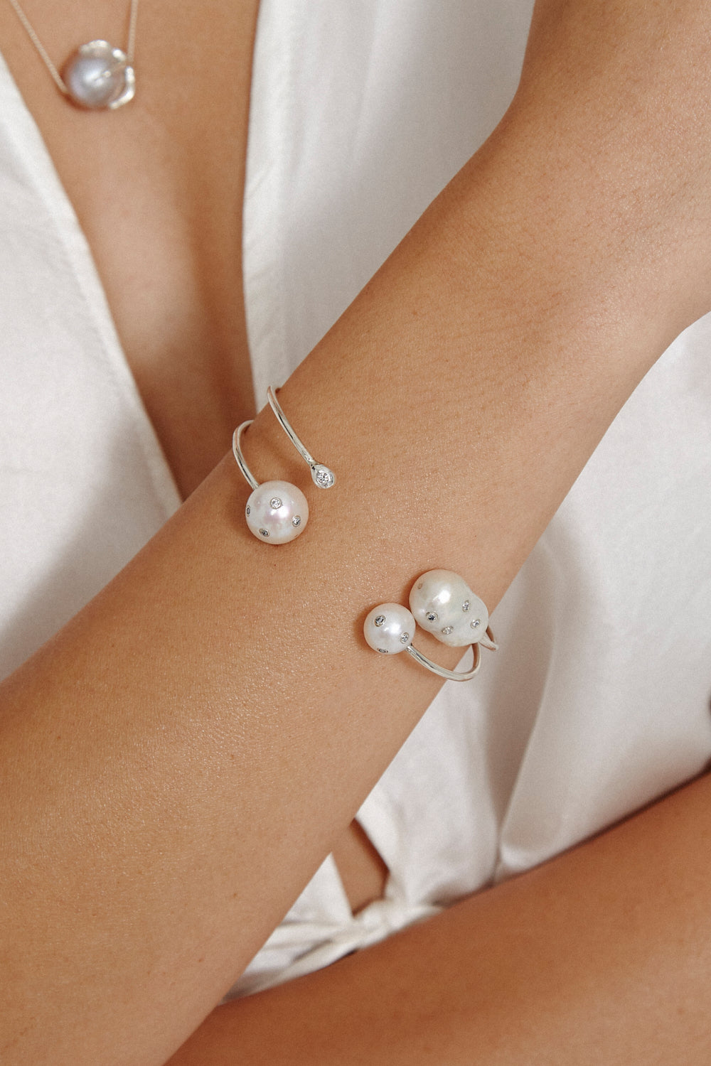 Diamond Cuff Bracelet with White Pearl Design