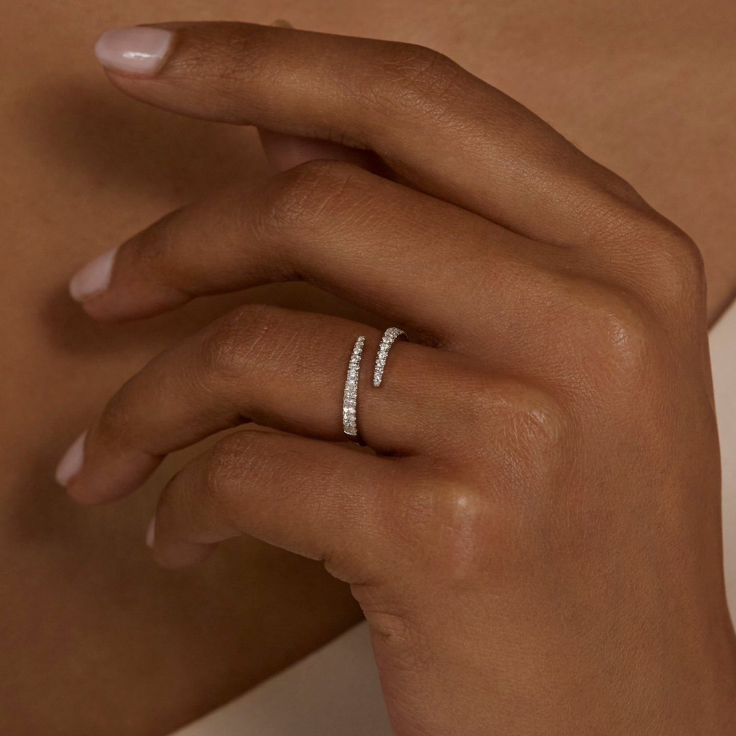 Elegant Diamond Twirl Ring in Silver