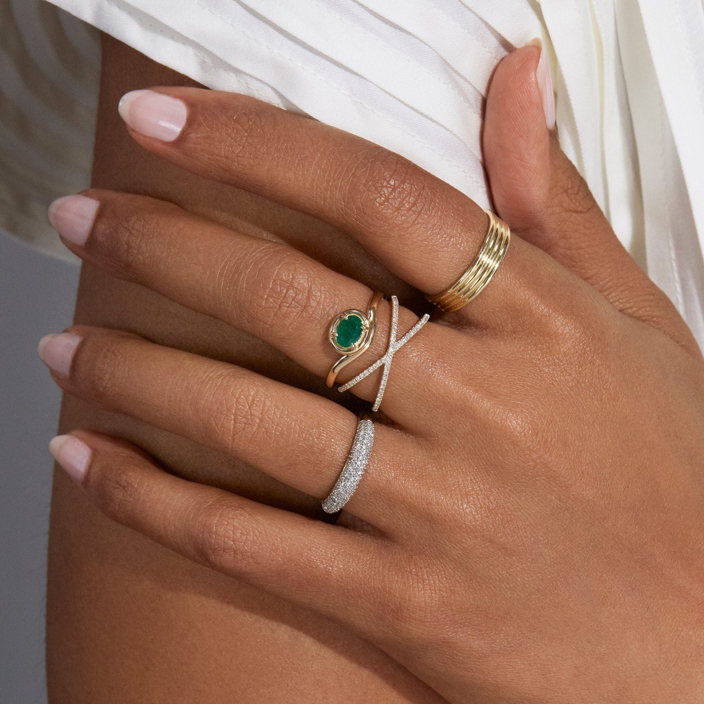 Emerald and Silver Merge Ring Design