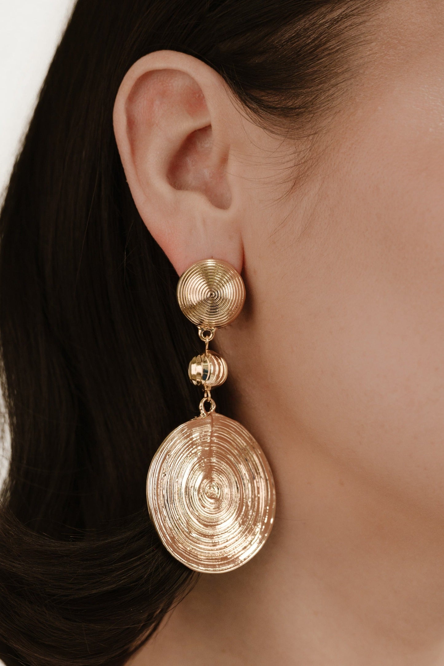 Dangle Earrings with Swirl Pendant Design