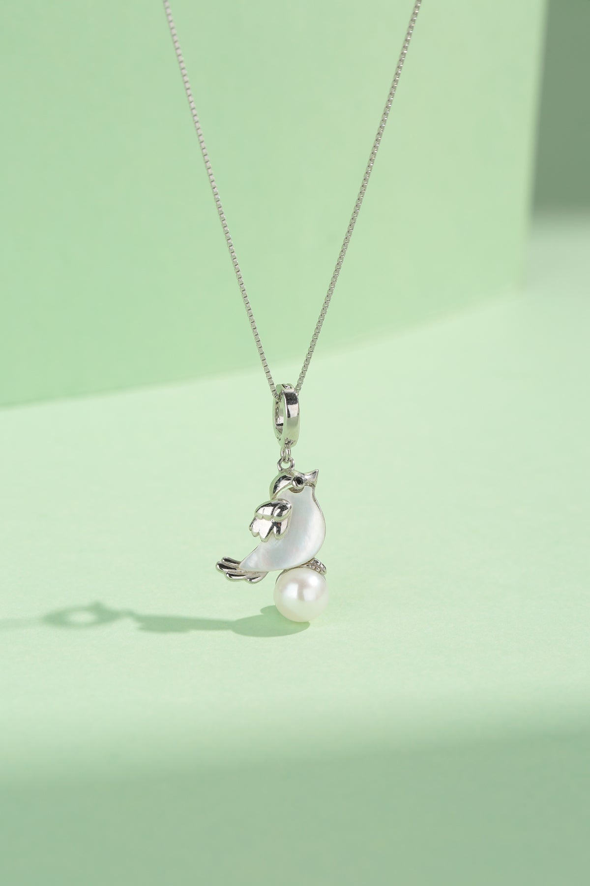 Pearl Pendant with Mother of Pearl Bird Design