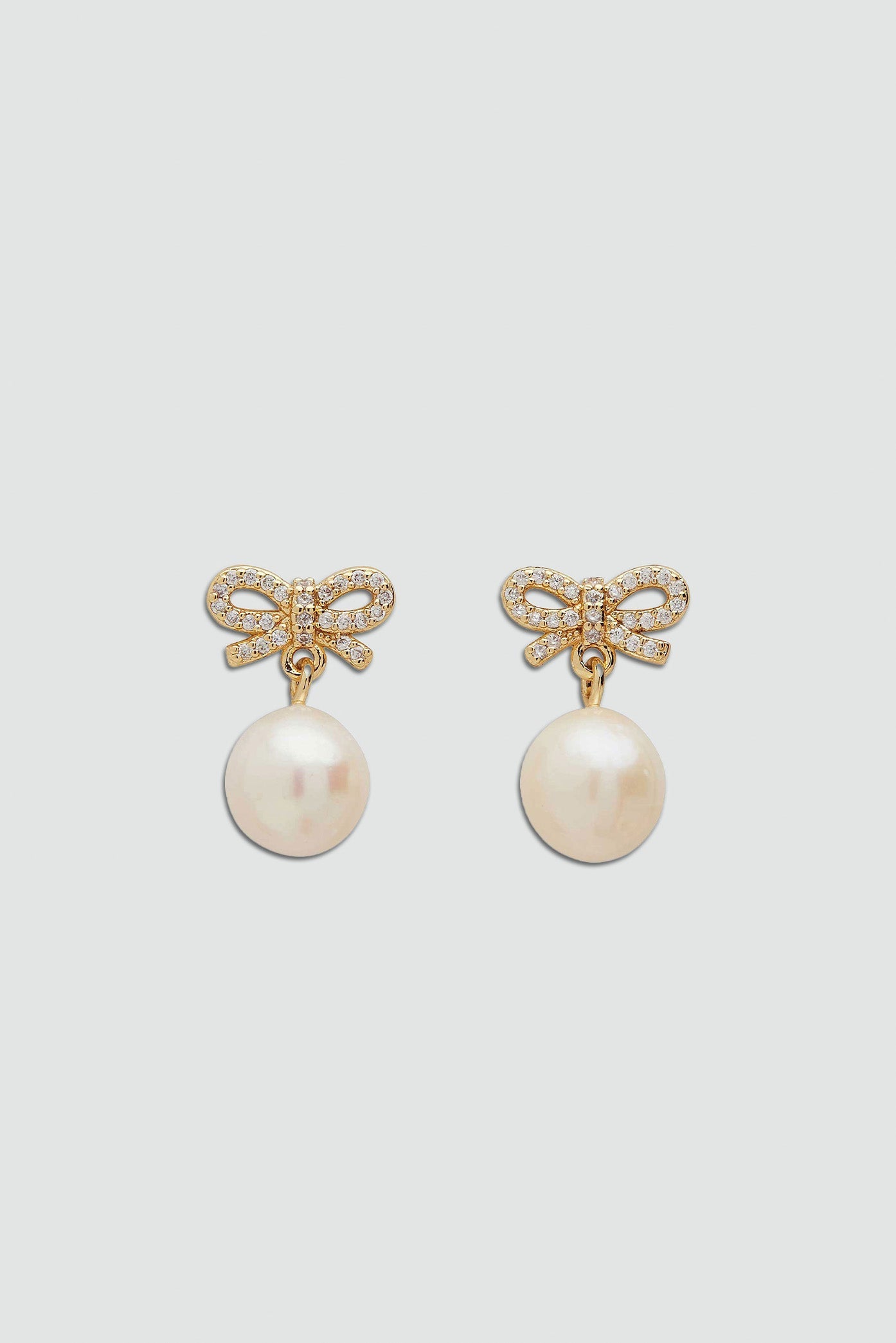 Pearl Stud Earrings with Bow Design