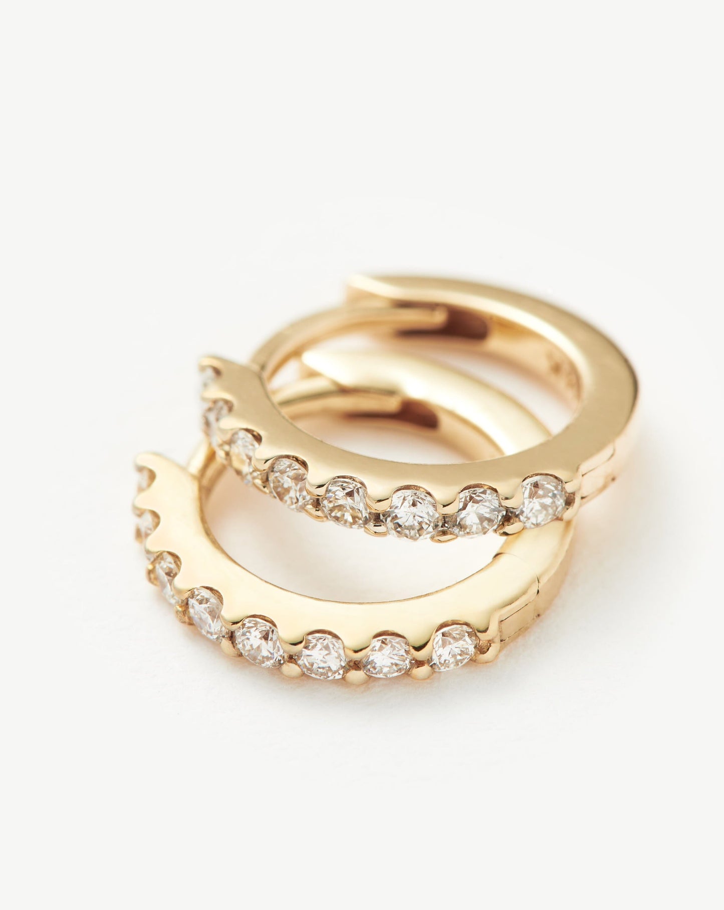 Classic Diamond Huggie Earrings in Solid Gold