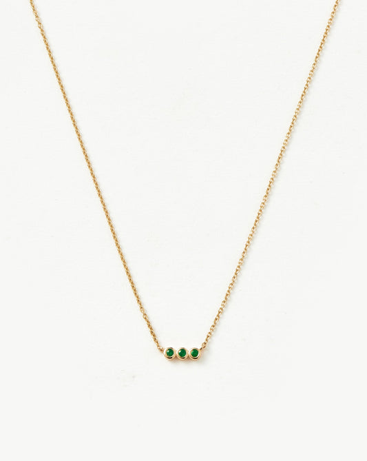 Emerald Solitaire Trio Necklace in Fine Design