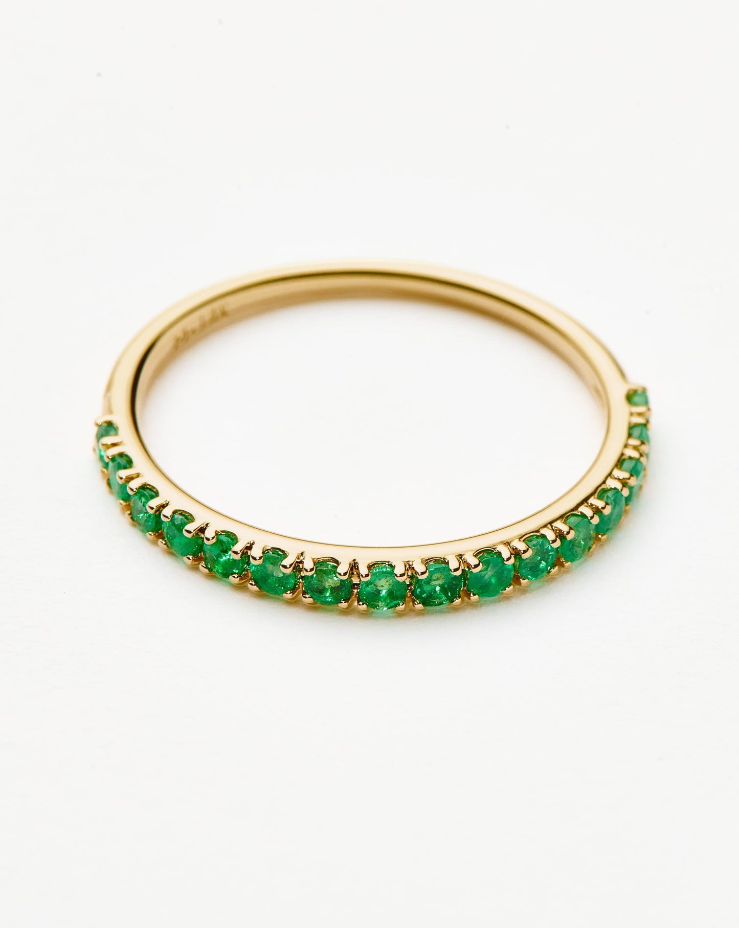 Emerald Half Eternity Ring in Fine Design