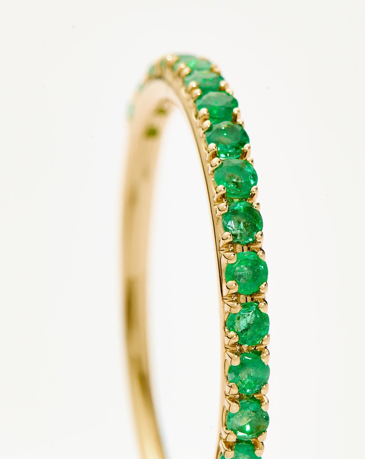 Emerald Half Eternity Ring in Fine Design