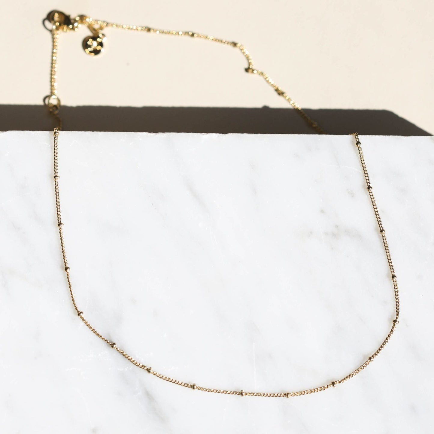 Delicate Gold Saturn Chain Necklace