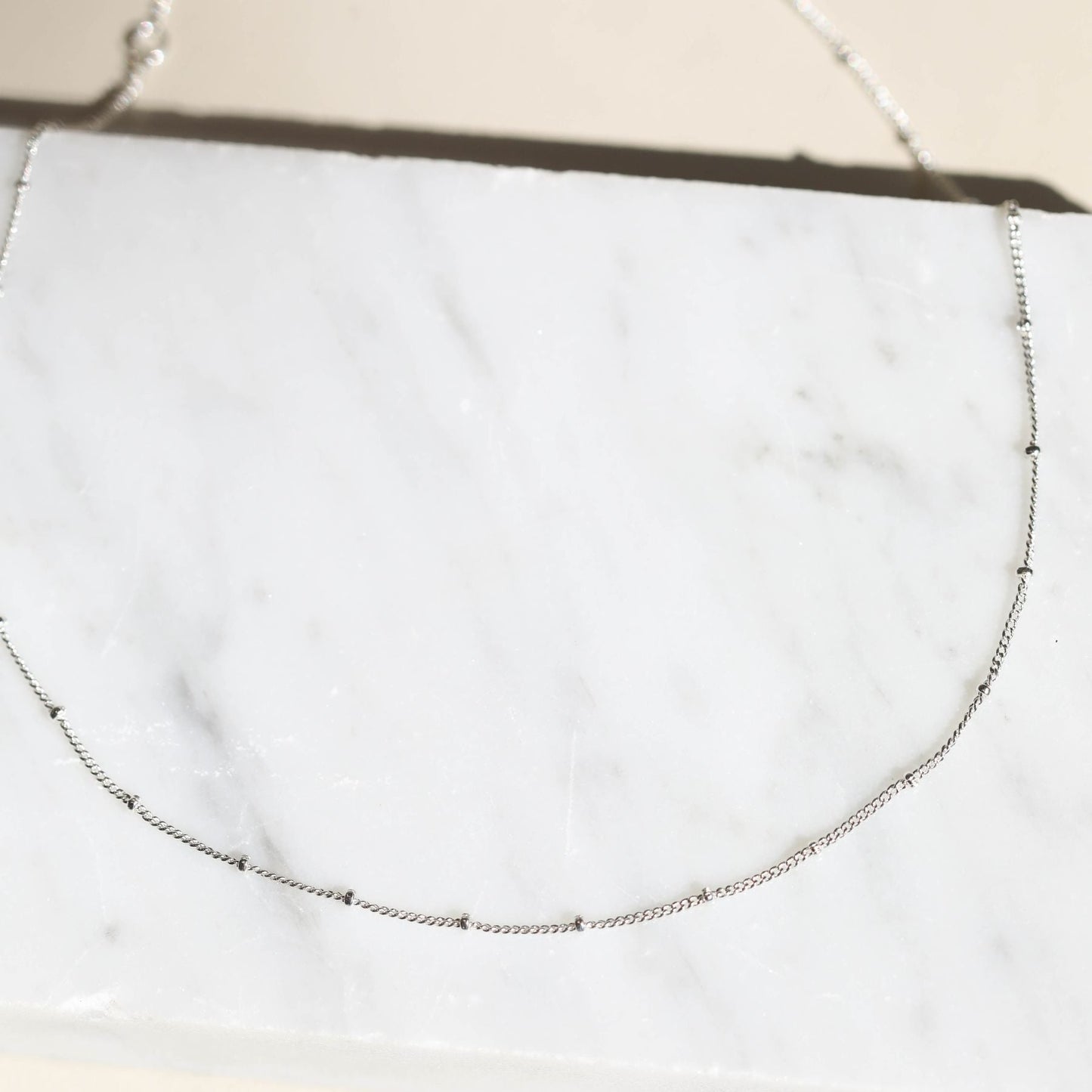 Delicate Saturn Chain Necklace in Silver