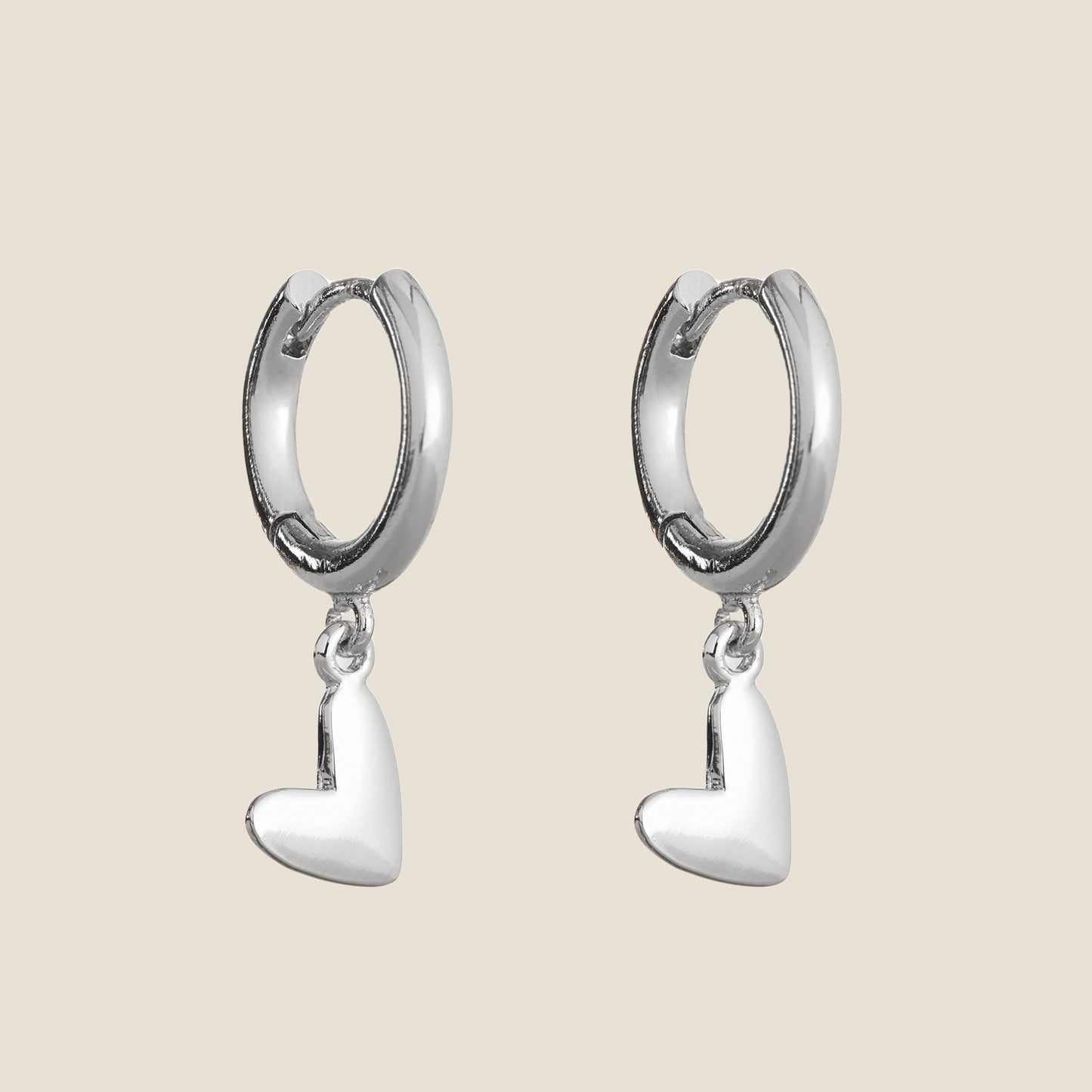 Sweetheart Huggie Earrings in Silver