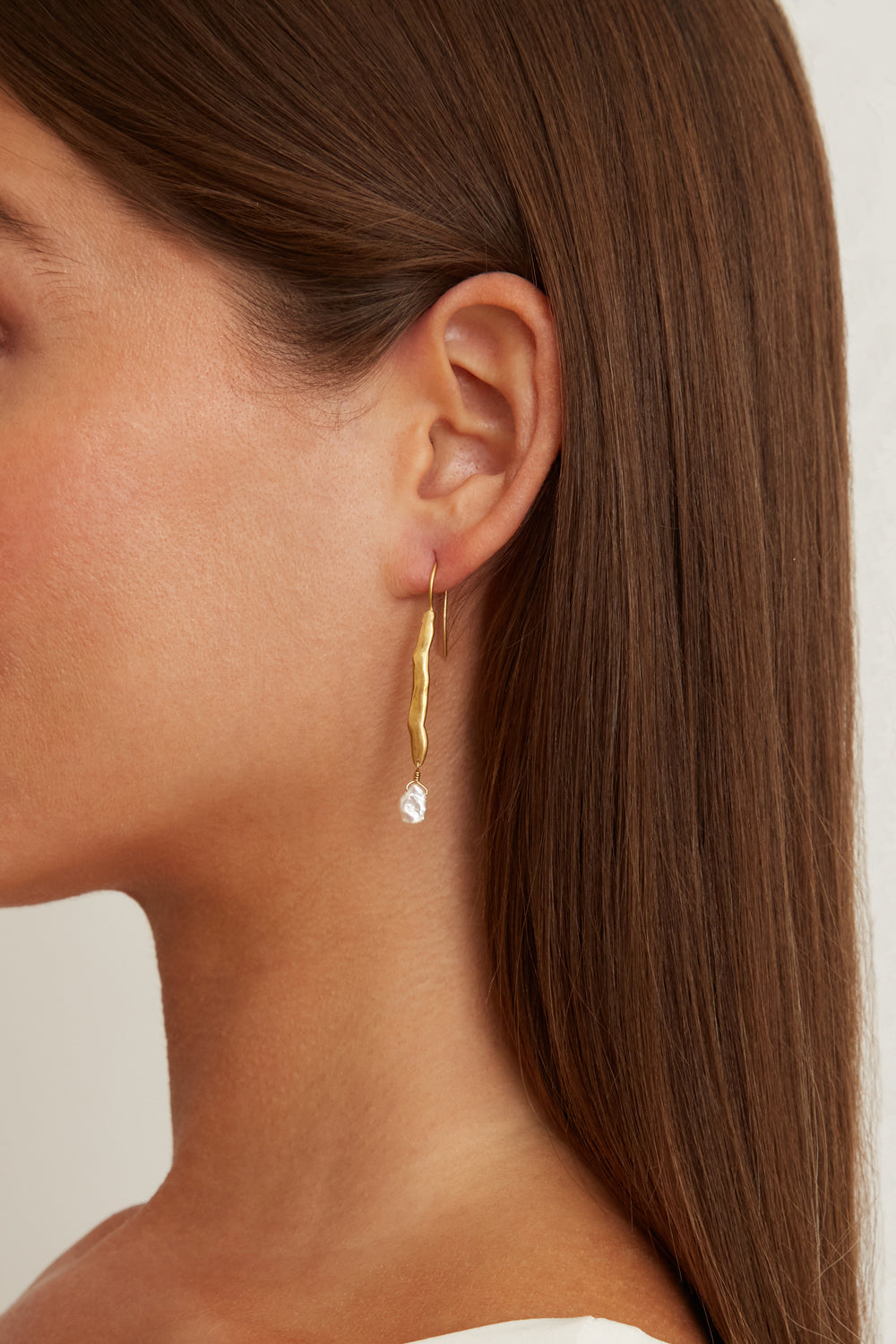 Elegant Gold Wave Pearl Drop Earrings