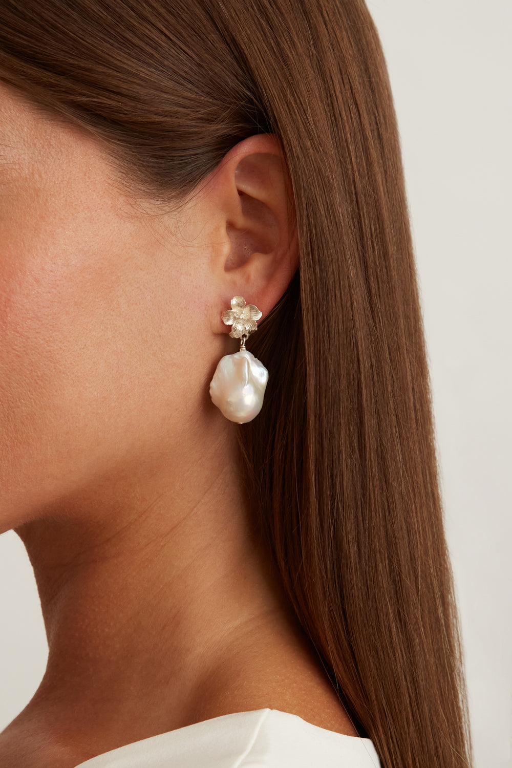 Elegant Silver Pearl Drop Earrings with Hibiscus Design