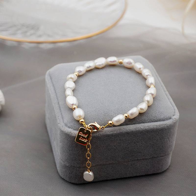 Engraved Pearls Bracelet with Lucky Charm