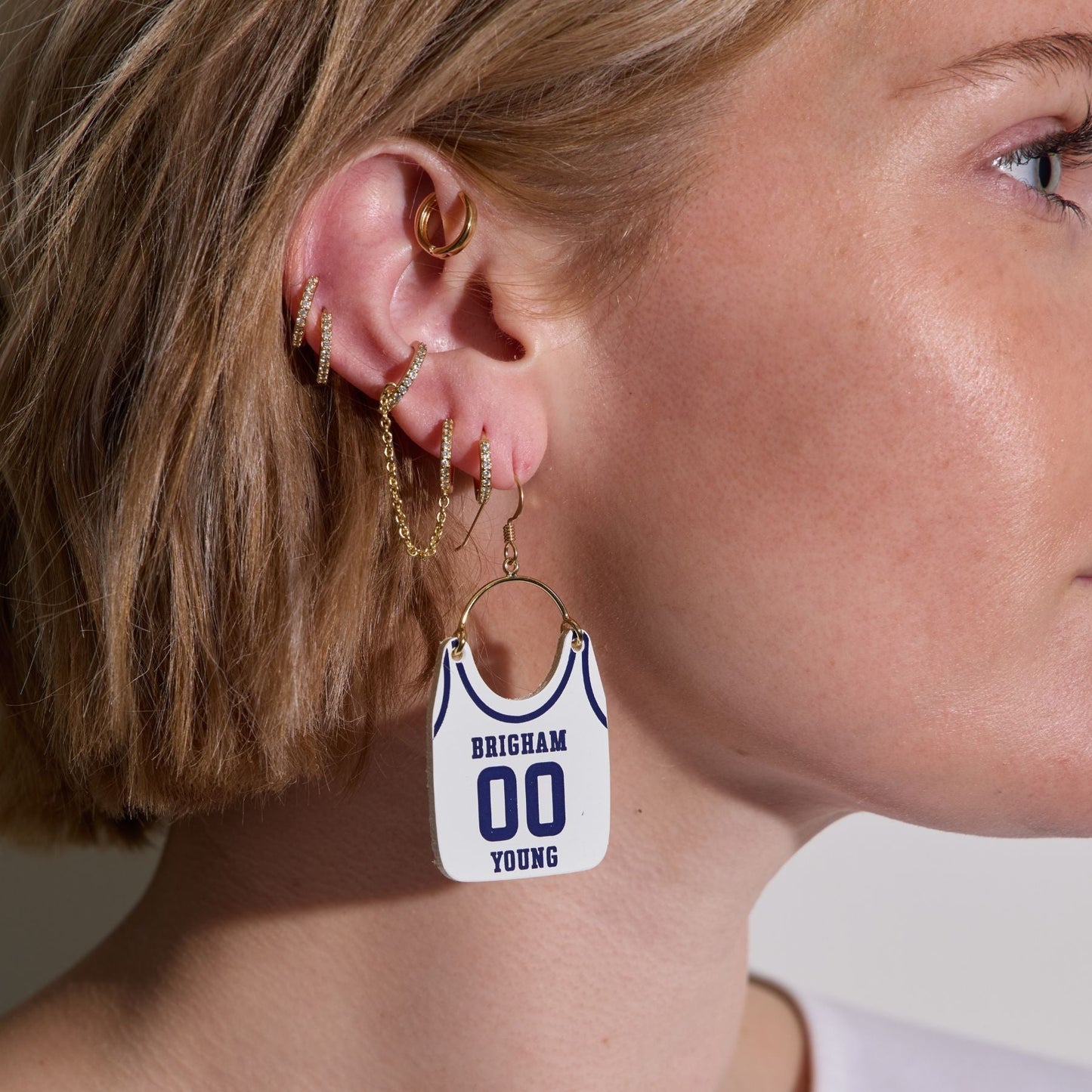 White Jersey Earrings with Cosmo Design